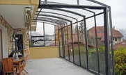 Natkrivena terasa iza kuće pokrivačem CORSO Solid