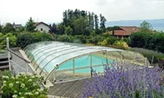 Niski pokrivač za bazen ELEGANT neće narušiti cjelokupni izgled vaše bašte